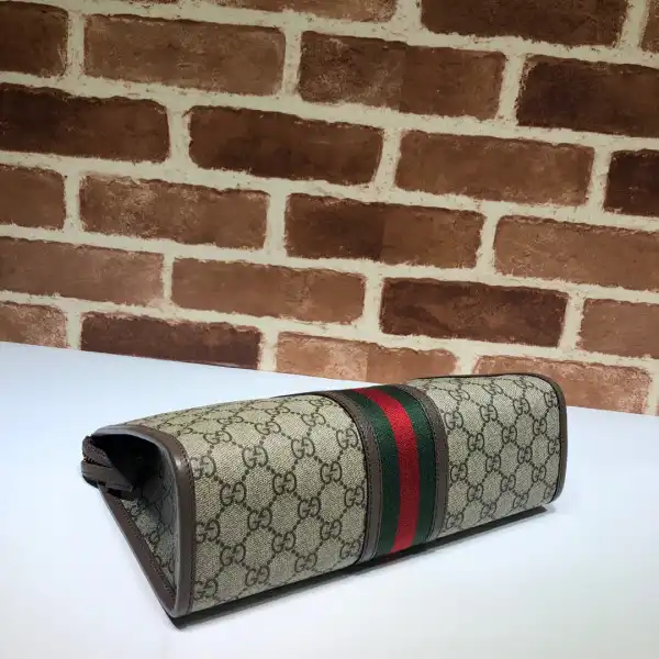 First bag ru Gucci Ophidia toiletry case