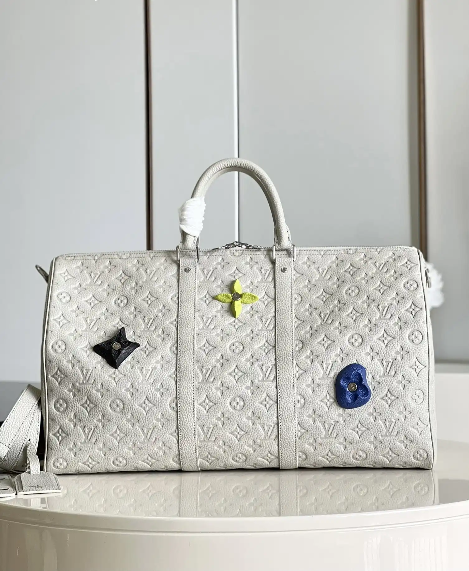 TO LOUIS VUITTON KEEPALL 50