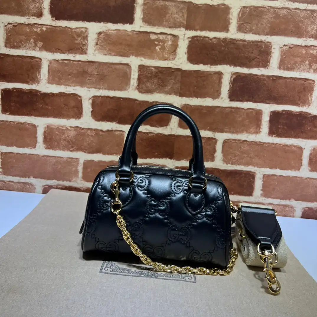 GUCCI GG matelassé leather top handle bag