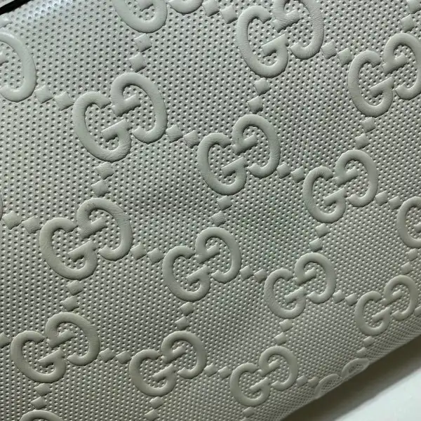 Cheap GUCCI GG embossed messenger bag