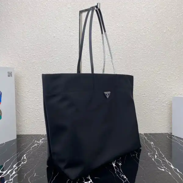 First bag ru PRADA Re-Nylon and Saffiano leather tote bag