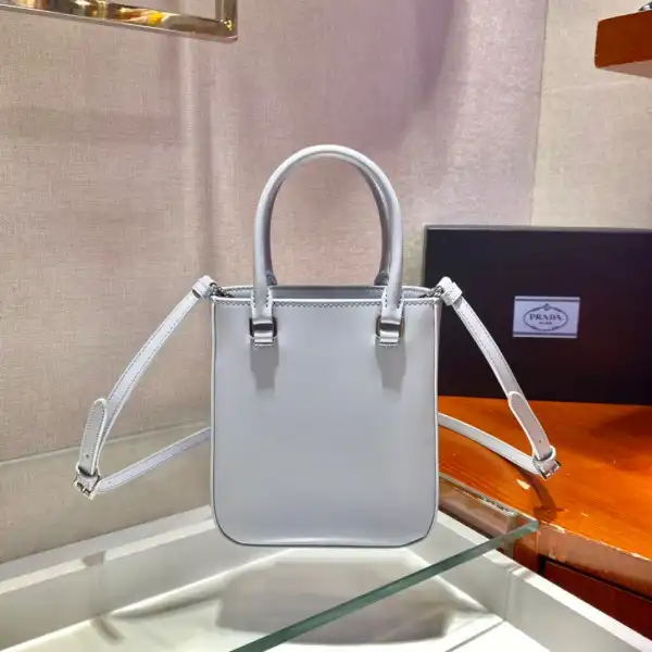 First bag ru PRADA Small brushed leather tote