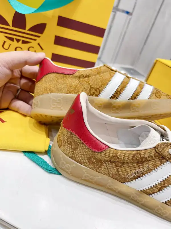 First bag ru Adidas x Gucci women's Gazelle sneaker