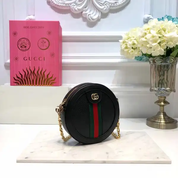 First bag ru Gucci Ophidia mini round shoulder bag