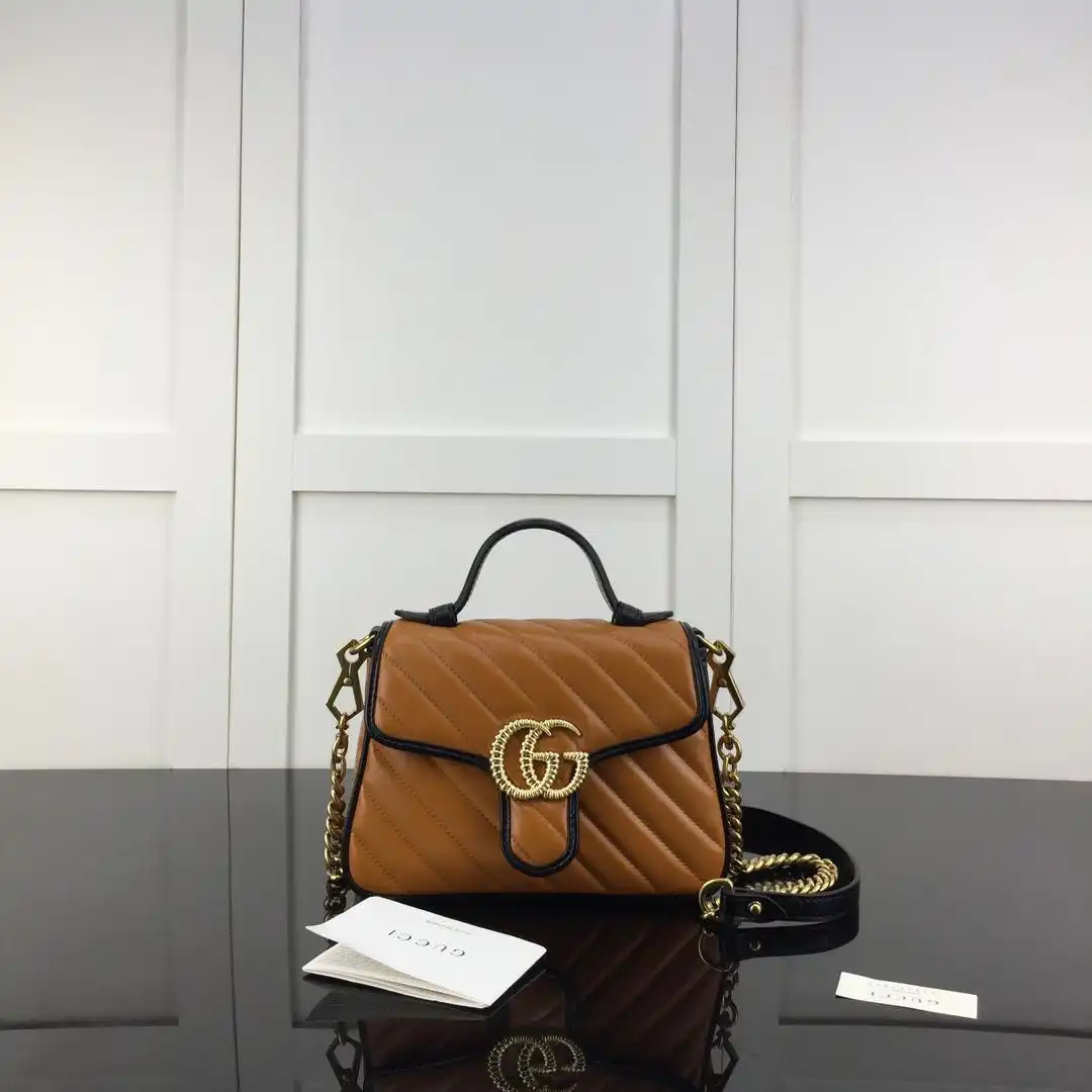 First bag ru Gucci GG Marmont mini top handle bag