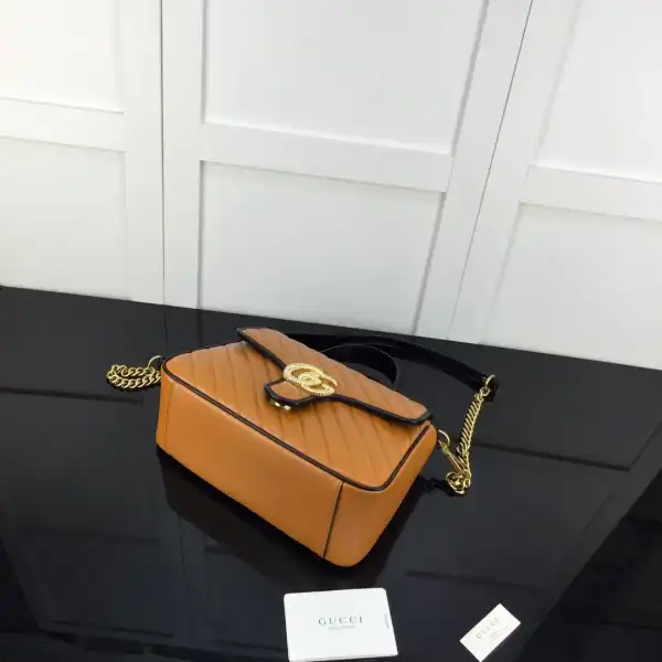 First bag ru Gucci GG Marmont small top handle bag