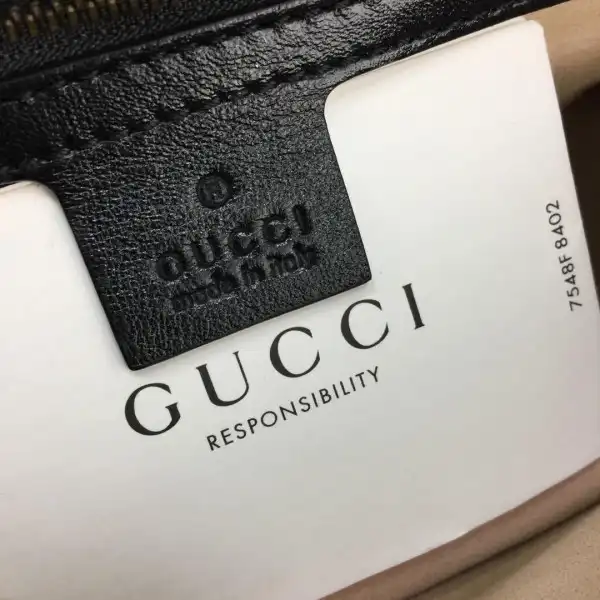 First bag ru Gucci GG Marmont small top handle bag