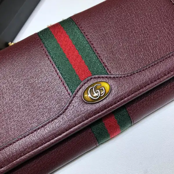 First bag ru GUCCI Ophidia GG chain wallet