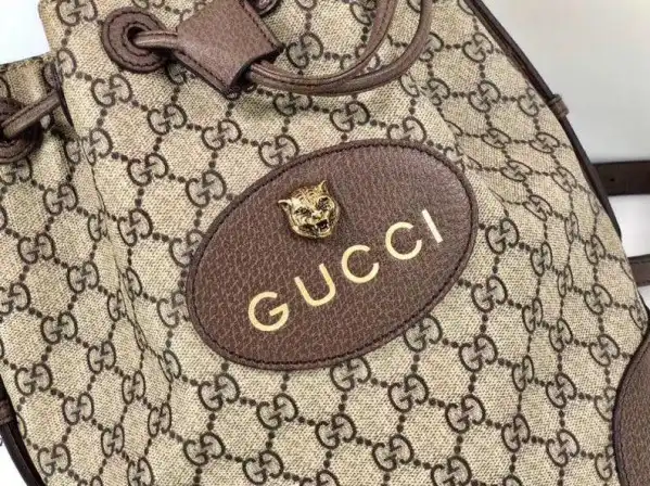 First bag ru Gucci GG backpack