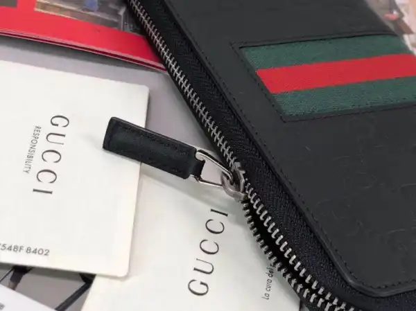 First bag ru Gucci Signature Web zip around wallet