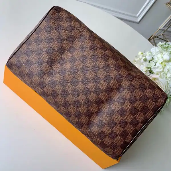 Eliminating the middleman and passing on savings to you. With massive production and tax-free benefits Louis Vuitton SPEEDY 30