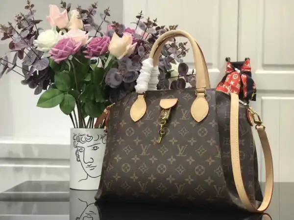 Frstbag ru LOUIS VUITTON RIVOLI MM