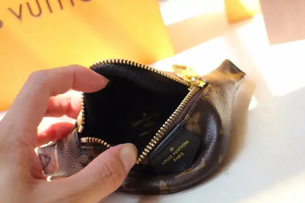 LOUIS VUITTON WRIST BAG