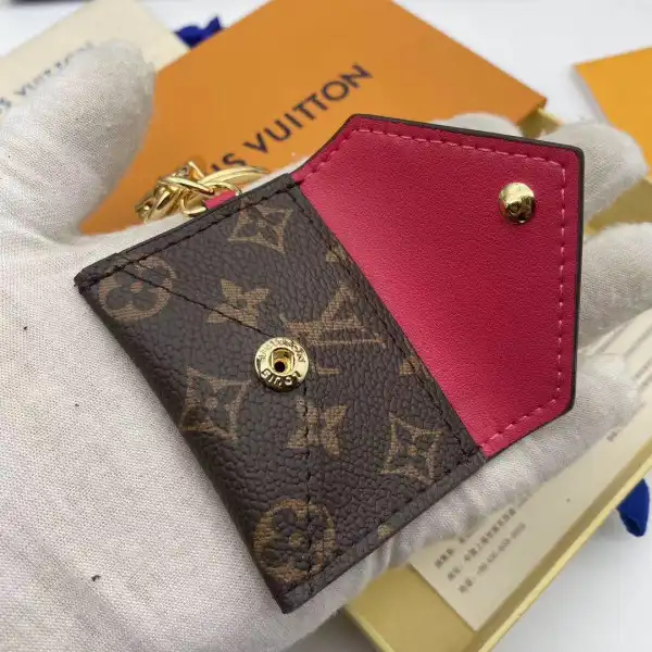 Frstbag ru LOUIS VUITTON KIRIGAMI POUCH BAG CHARM AND KEY HOLDER