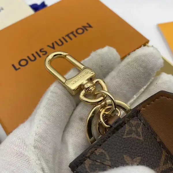 First Bag Ru LOUIS VUITTON KIRIGAMI POUCH BAG CHARM AND KEY HOLDER