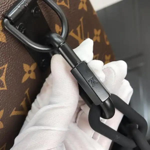 Frstbag ru LOUIS VUITTON KEEPALL BANDOULIÈRE 50