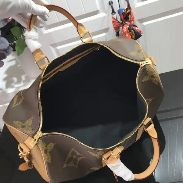 First bag ru LOUIS VUITTON KEEPALL BANDOULIÈRE 50