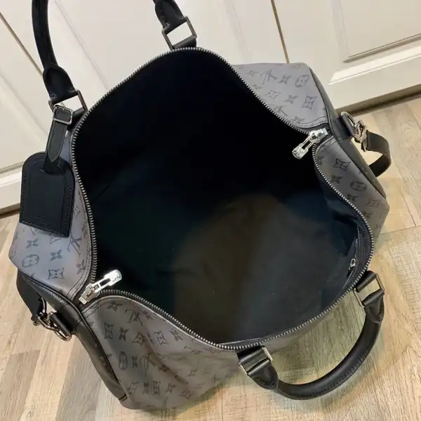 Frstbag ru LOUIS VUITTON KEEPALL BANDOULIÈRE 50