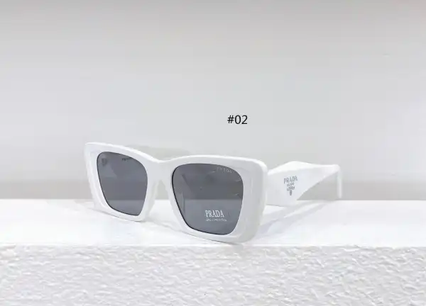 PRADA SUNGLASSES