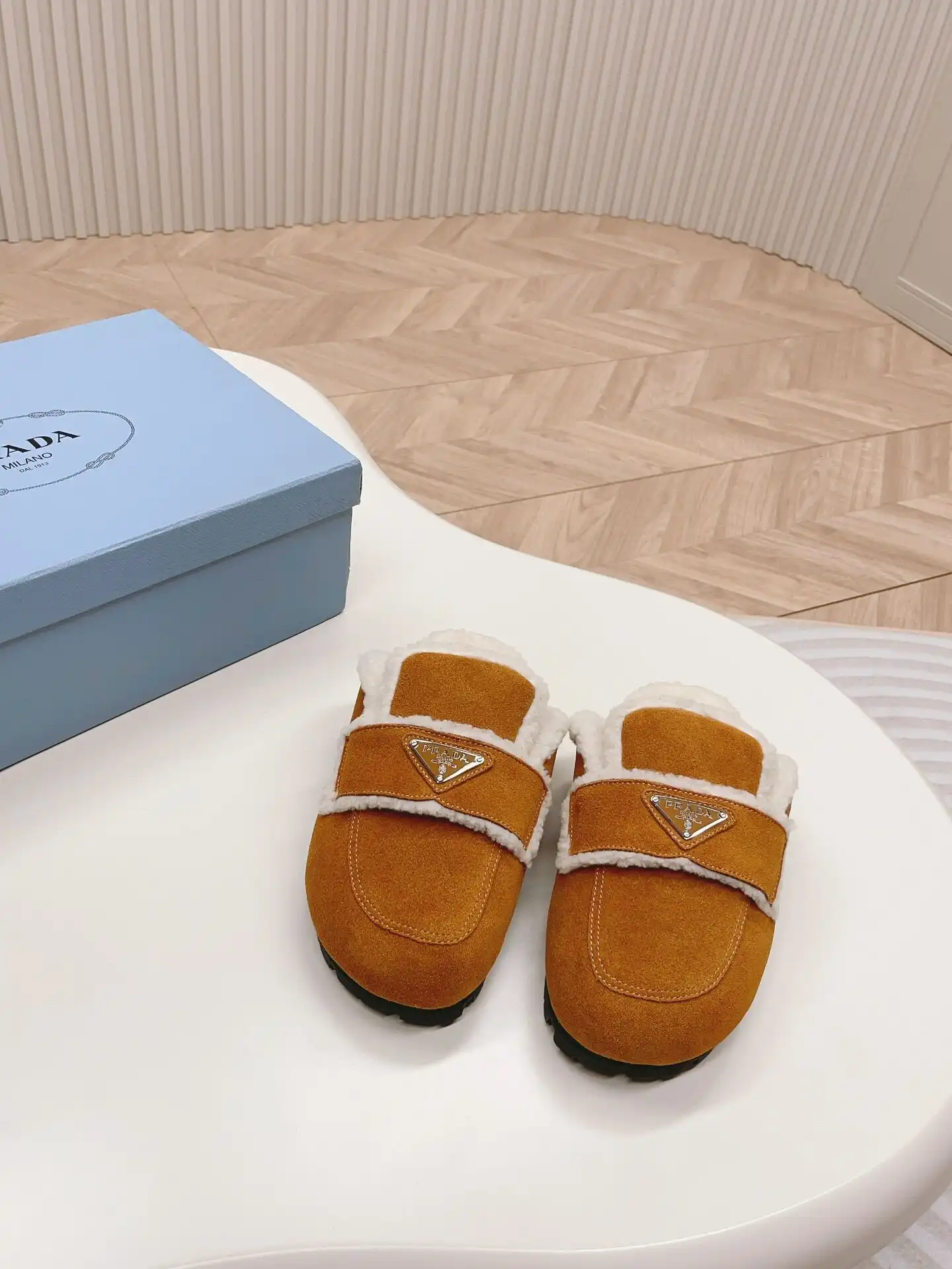 PRADA SHEARLING SLIPPERS