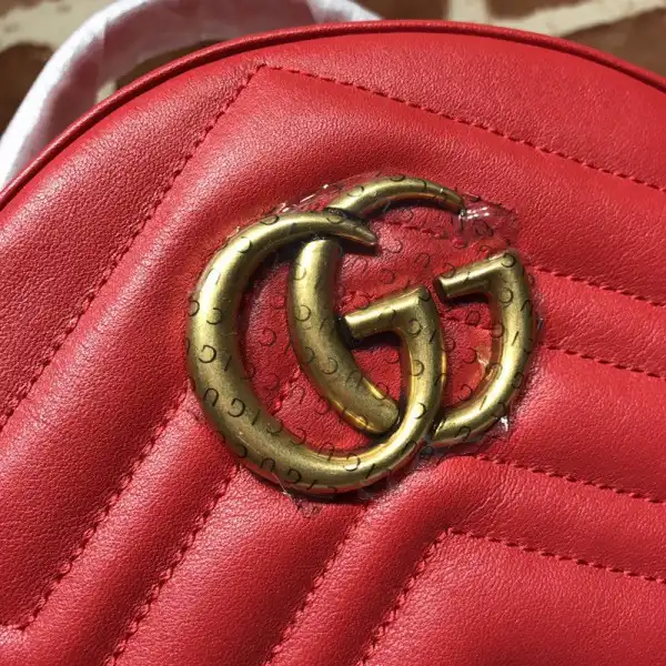 First bag ru Gucci GG Marmont Backpack