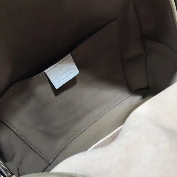 First bag ru Gucci GG Marmont Backpack