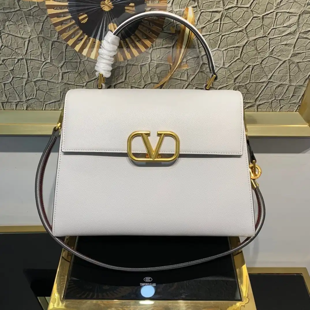 First bag ru VALENTINO VSLING GRAINY CALFSKIN HANDBAG