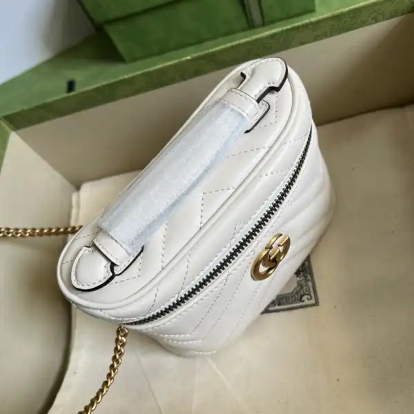 First bag ru GUCCI GG Marmont mini top handle bag