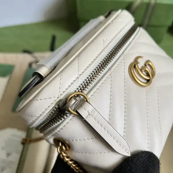 First bag ru GUCCI GG Marmont mini top handle bag