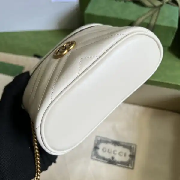 First bag ru GUCCI GG Marmont mini top handle bag