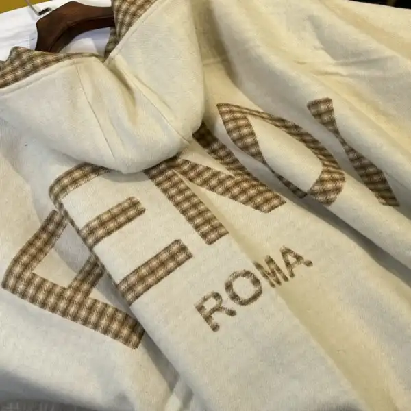 First bag ru Fendi Poncho