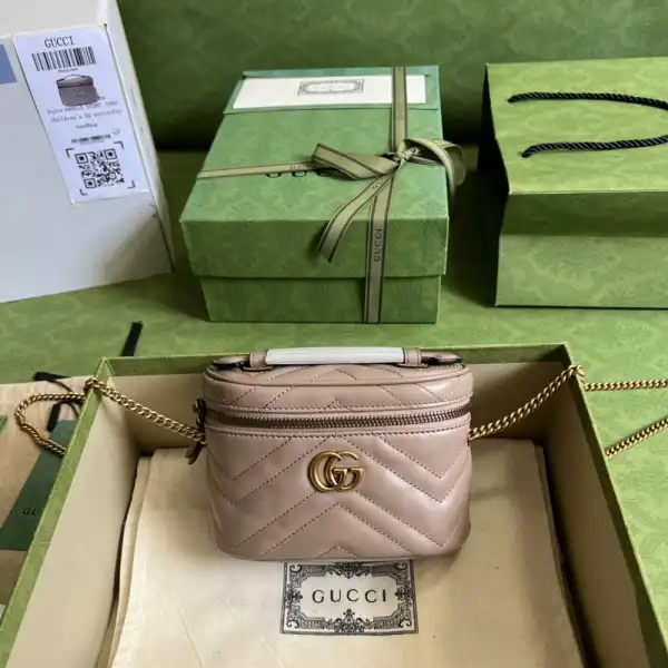 First bag ru GUCCI GG Marmont mini top handle bag