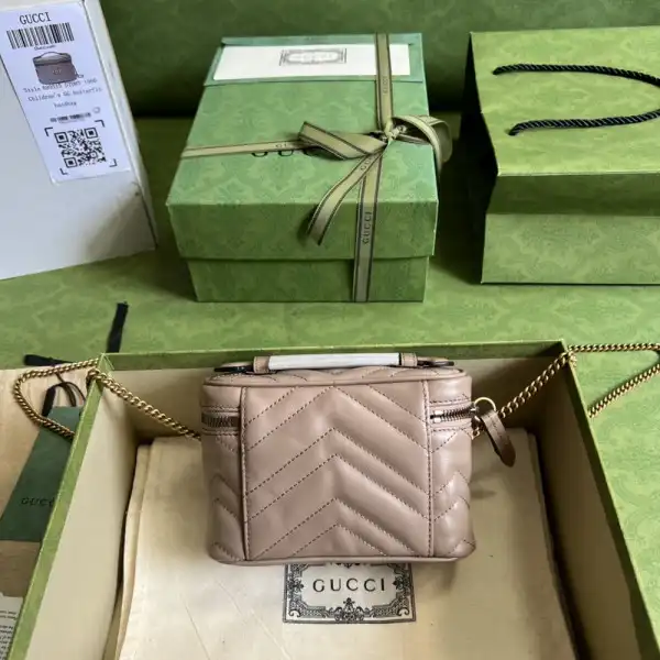 First bag ru GUCCI GG Marmont mini top handle bag