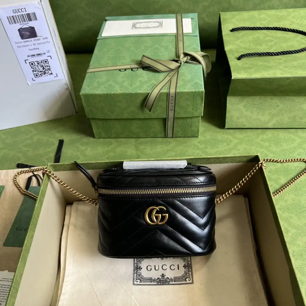 First bag ru GUCCI GG Marmont mini top handle bag