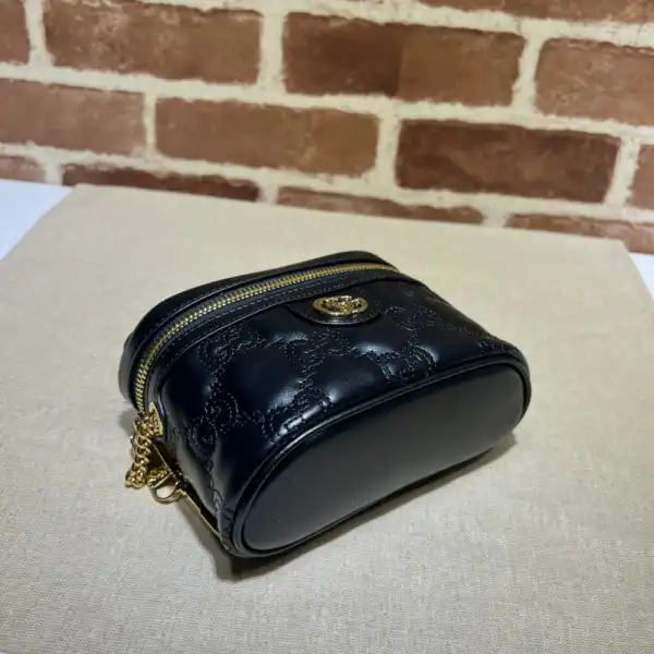 GUCCI GG Matelassé top handle mini bag