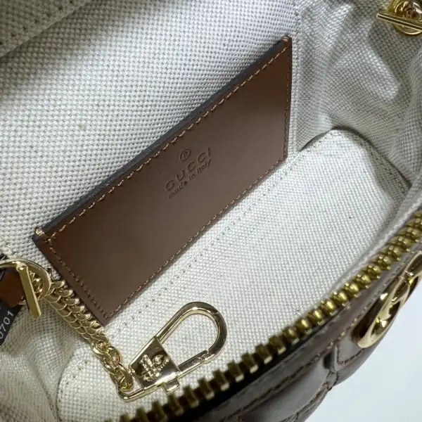 First bag ru GUCCI GG Matelassé top handle mini bag