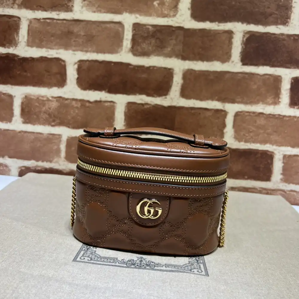 First bag ru GUCCI GG Matelassé top handle mini bag