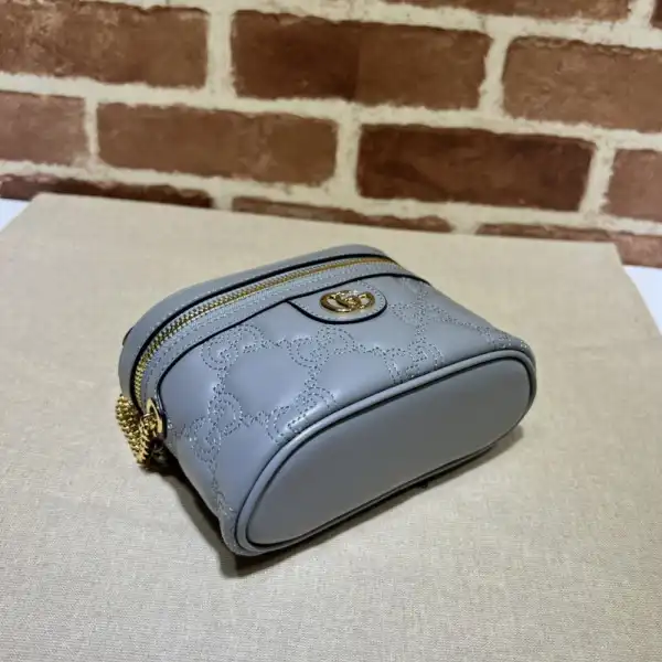 First bag ru GUCCI GG Matelassé top handle mini bag