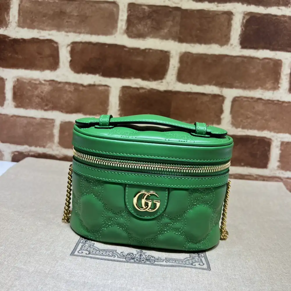 First bag ru GUCCI GG Matelassé top handle mini bag