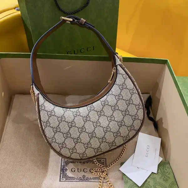 Gucci Half-moon-shaped mini bag with Interlocking G