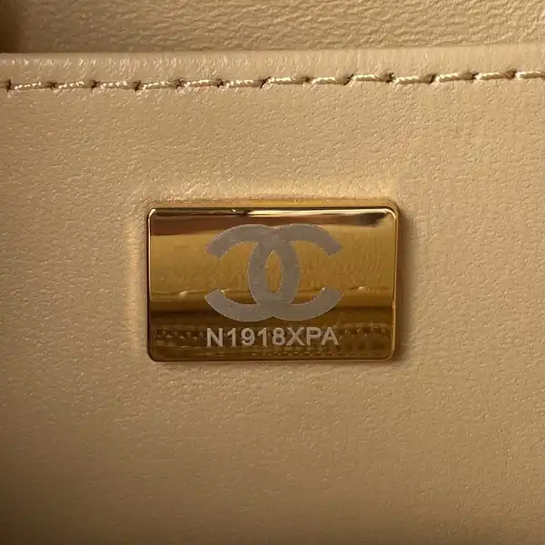 CHANEL FLAP BAG WITH TOP HANDLE