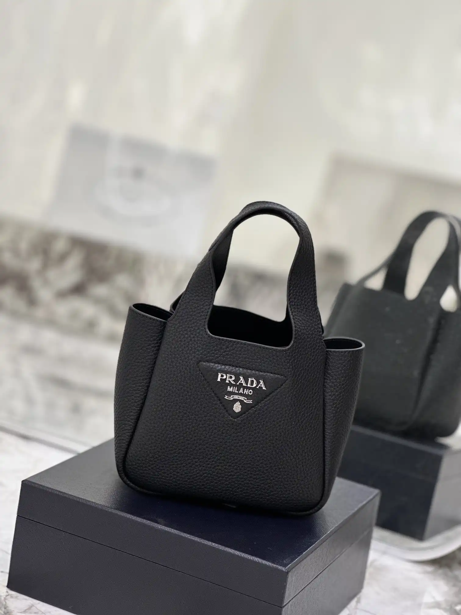 First bag ru PRADA  Leather mini bag