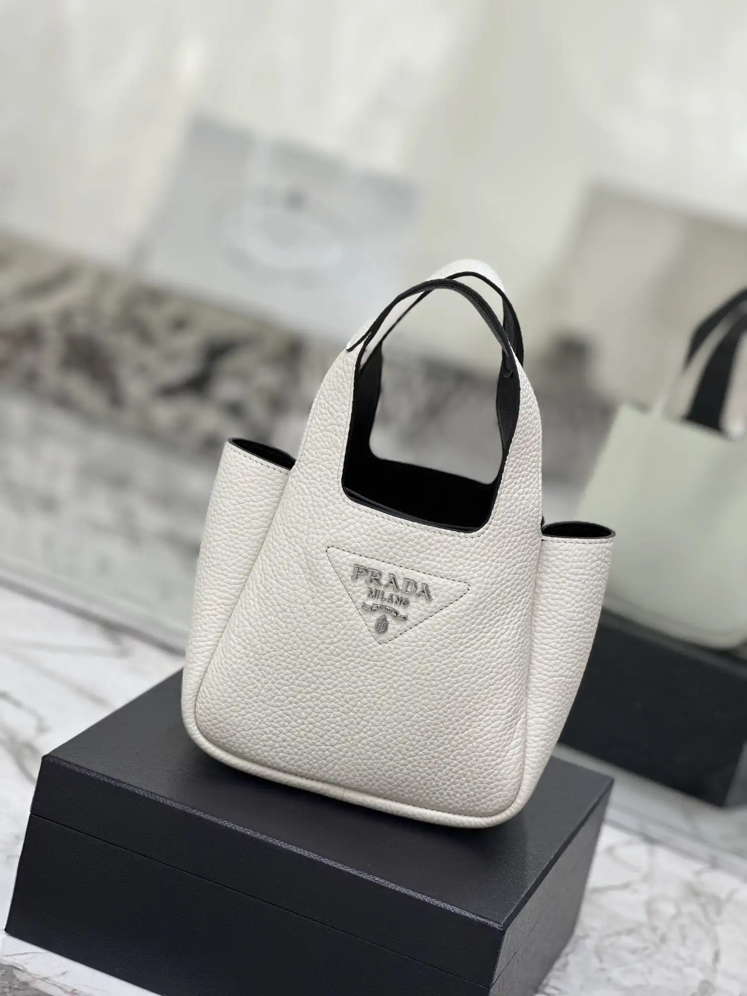 First bag ru PRADA  Leather mini bag