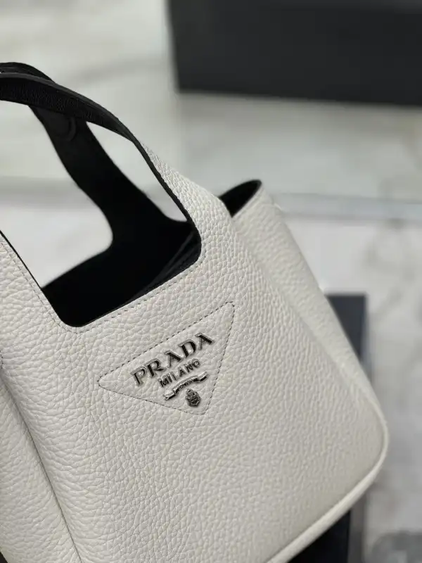 First bag ru PRADA  Leather mini bag