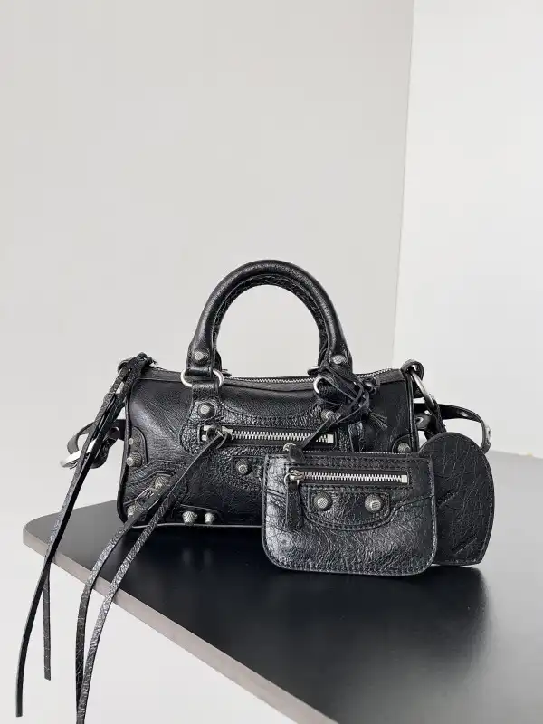 Frstbag ru BALENCIAGA WOMEN'S LE CAGOLE MINI DUFFLE BAG IN BLACK