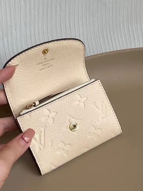 First bag ru Louis Vuitton Rosalie Coin Purse