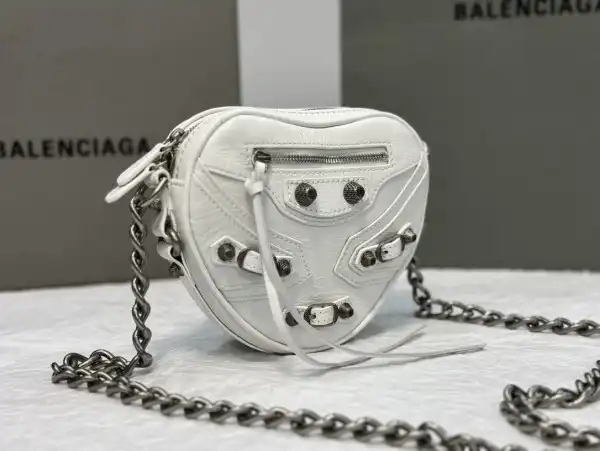 First bag ru BALENCIAGA  Le Cagole Heart mini metallic crinkled-leather shoulder bag