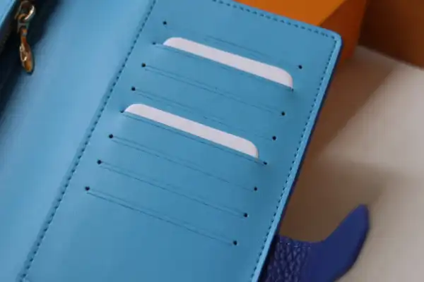 TO LOUIS VUITTON VERTICAL WALLET