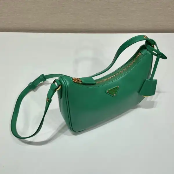 First bag ru Prada Re-Edition Saffiano leather mini bag