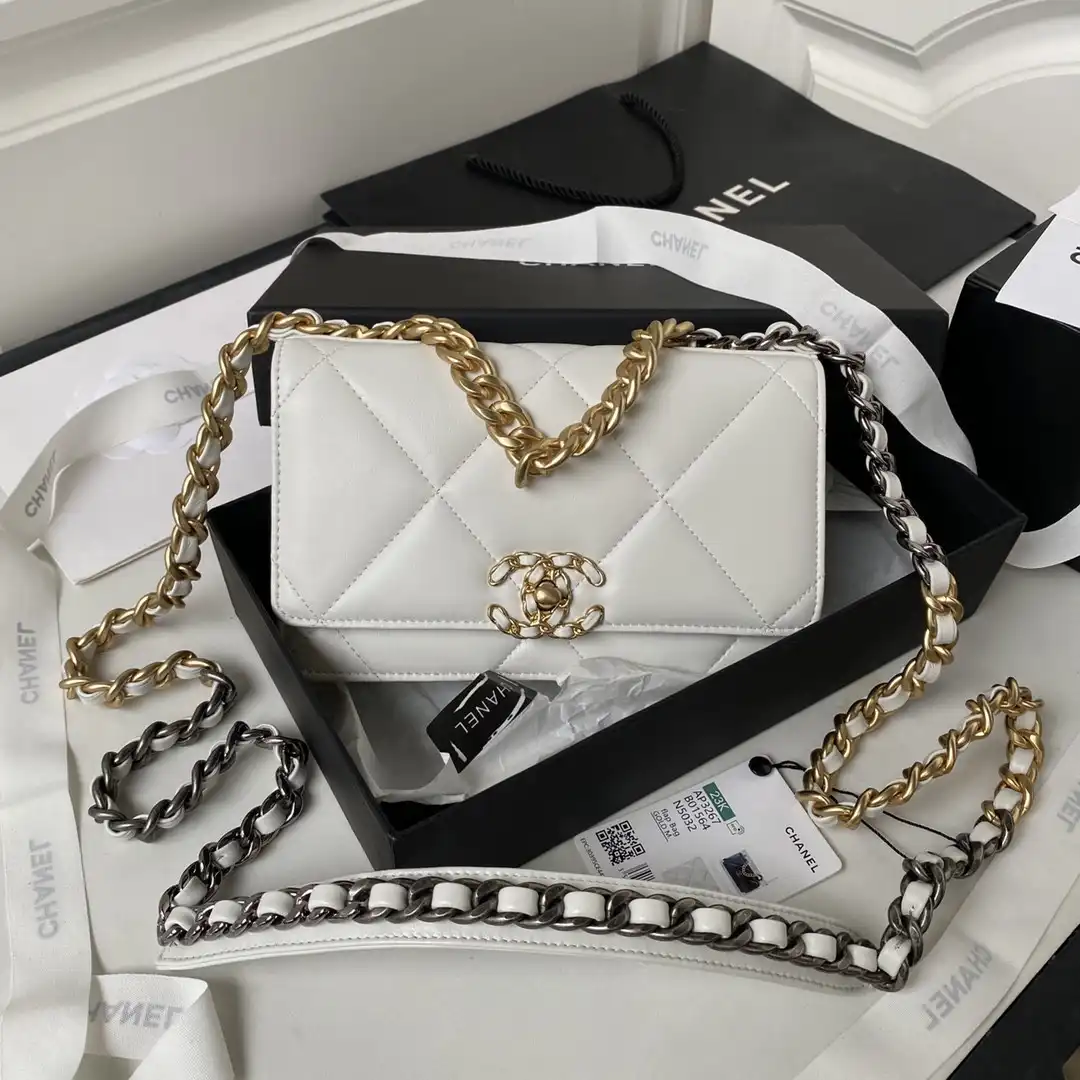 First bag ru CHANEL 19 WALLET ON CHAIN